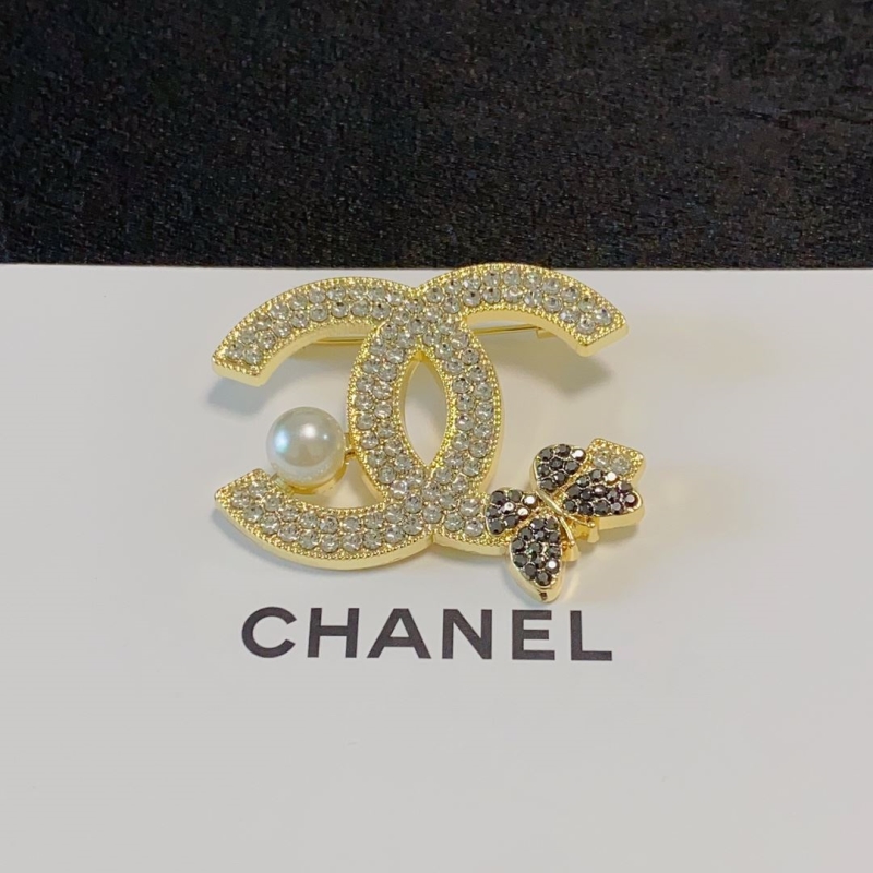 Ch**el brooches